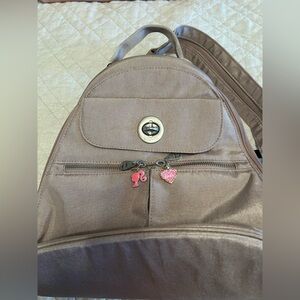 Blush Backpack with Pink Barbie Charms
Small size and easily carried